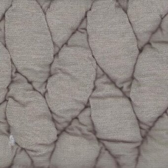 Moroso fabric sample, greige Big Braid textile, displaying a quilted diamond pattern with dense interwoven braid texture and matte finish.